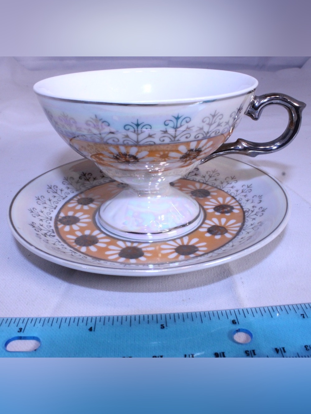 Vintage “Silver Daisy” Royal Sealy Japan footed teacup and saucer set